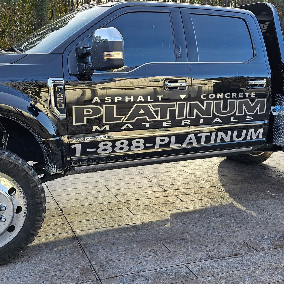 Platinum asphalt and concrete graphics on a black pickup